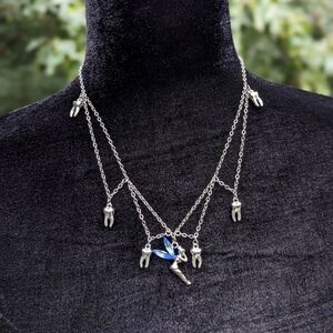 Handmade "tooth fairy" metal necklace